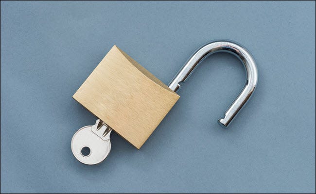 An open padlock with key inserted.