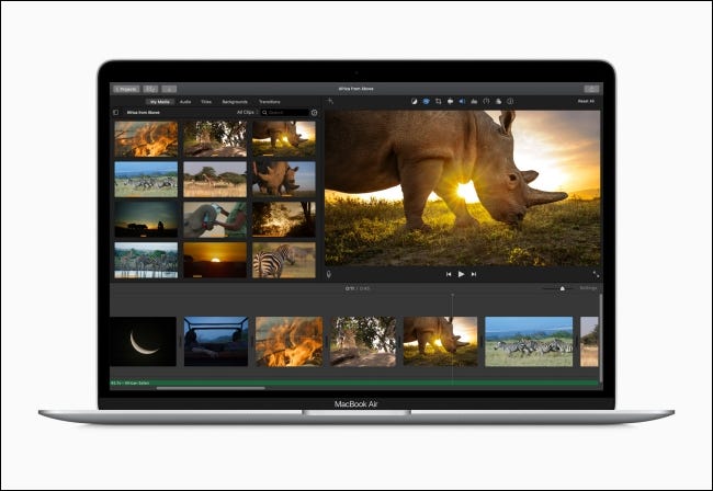 A MacBook Air with video editor onscreen.