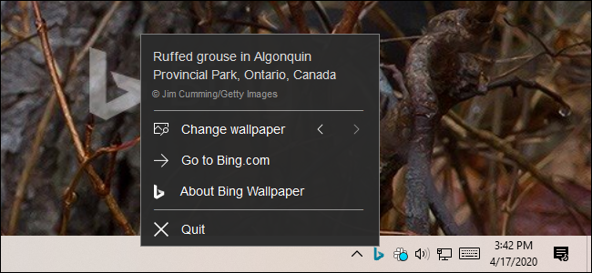 Controlling the Bing Wallpaper application from its notification area icon.