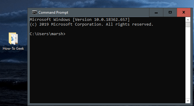 An animated GIF showing a file being dragged and dropped in Command Prompt.