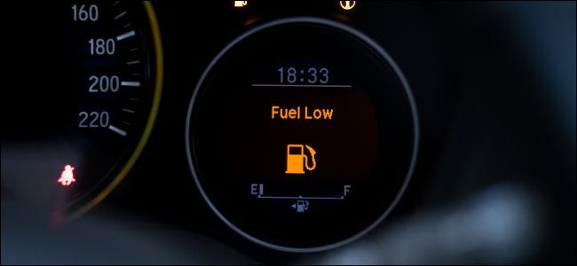 A Fuel Low message on a gas gauge.