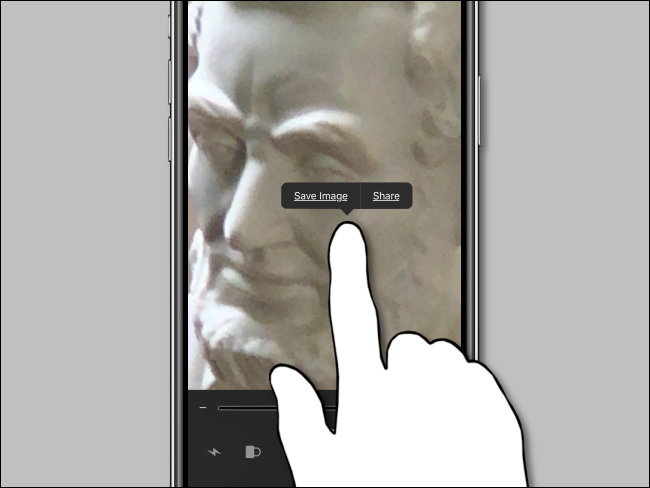 Tap and hold in Magnifier on iPhone to save the image