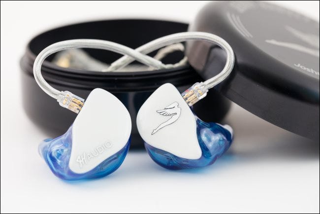 Custom in-ear monitor headphones for a musician.