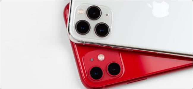 A red iPhone 11 and silver iPhone 11 Pro.