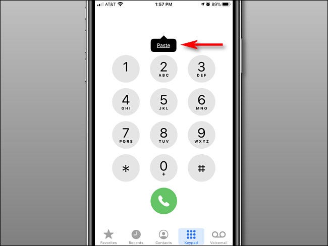 Tap the Paste button in the iPhone Phone app.