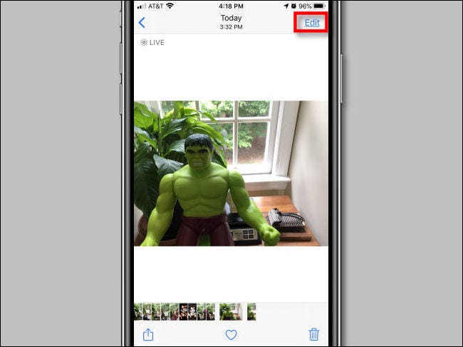 Tap the Edit button in Photos on iPhone.