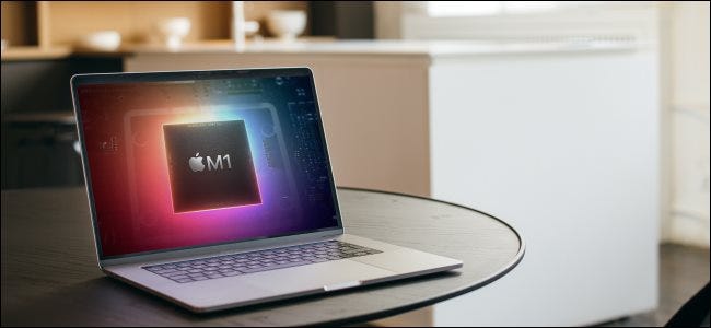 A MacBook with an M1 chip logo on its screen.