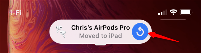 An iPhone notification saying AirPods moved to an iPad.