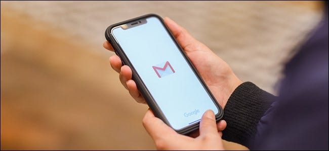 The Gmail logo on an iPhone.