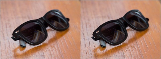 Two images of a pair of sunglasses on table, one blurry and one clear.