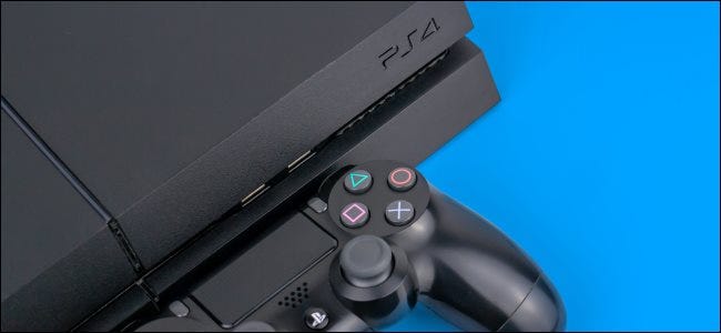 A Sony PlayStation 4 console with a DualShock 4 controller.