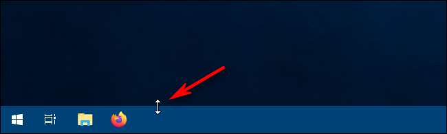 Using the resize cursor to resize the taskbar in Windows 10