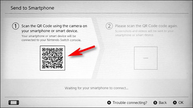 Using your smart device, scan the first QR code on the Switch.