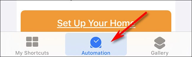 In Apple Shortcuts on iPhone, tap the Automation button at the bottom of the screen.
