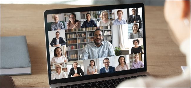 A man on a Google Meet video call on his laptop.